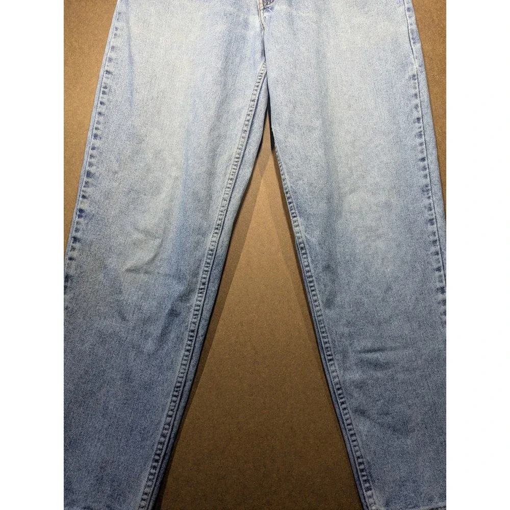 Vintage Levis 560 Loose Fit Tapered Leg Jeans Light Wash Made in USA 32x30